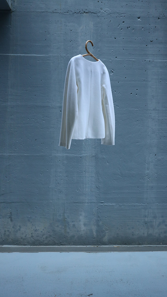 white wool closed jacket